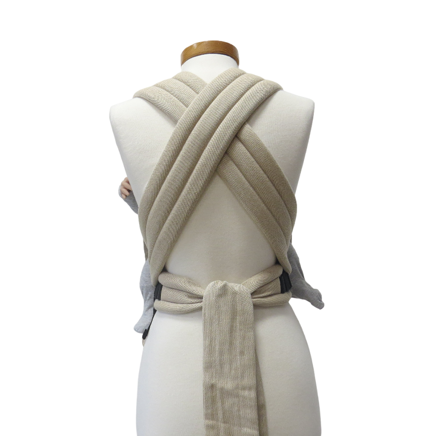 Babycarrier Natur Slim with adjustable half-buckle design and natural color.