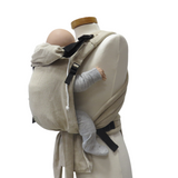 Babycarrier Natur Slim with adjustable straps and waist belt in natural color, worn on mannequin.