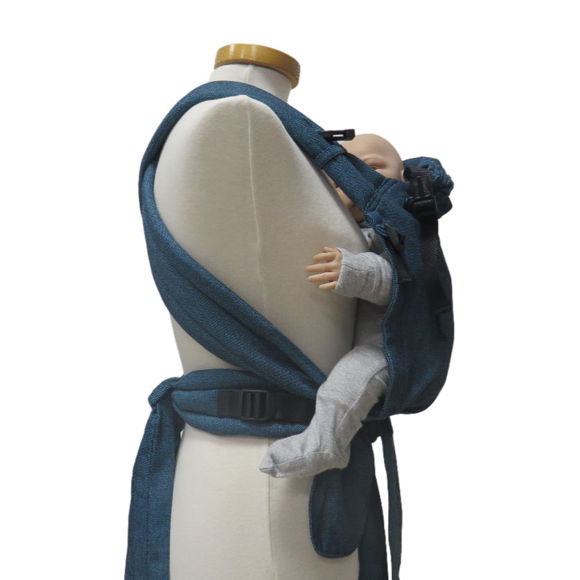 Babycarrier Türkis Slim with adjustable straps and waist belt for ergonomic baby support.