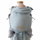 Optimal adjustable half-buckle baby carrier in ocean blue with binding waistbelt, suitable for newborns to 15kg, featuring padded straps, an adjustable baby seat, and integrated head support.