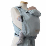 Ocean blue Babytrage Babycarrier Aqua Slim with adjustable half-buckle design on mannequin.