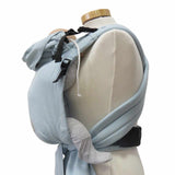 Blue babycarrier with adjustable buckles and padded straps for infants.