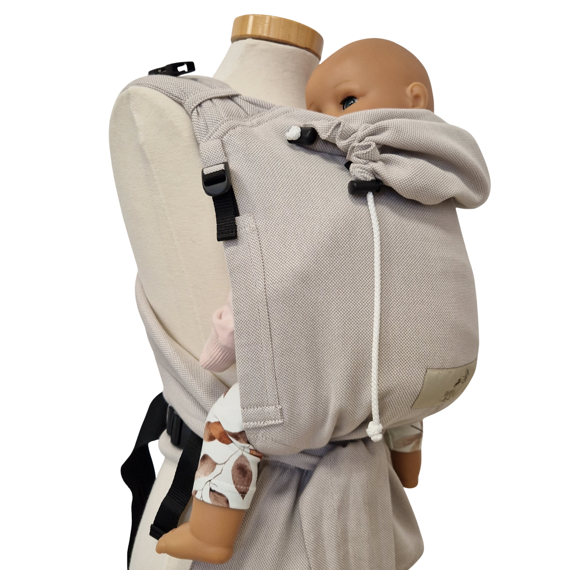 Optimal adjustable Mondstein baby carrier with padded straps and waist belt.