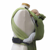 Green adjustable Babycarrier Leo, half-buckle design, comfortable padded straps, security buckle, ergonomic support for baby.