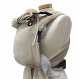 Optimal anpassbare Half-Buckle-Babytrage in Naturfarbe aus 100% Baumwolle.