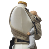 Babycarrier Sand half-buckle with adjustable, padded straps and safety buckle for infants.
