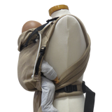 Babycarrier Sand with padded straps and safety buckle, suitable from birth to 15 kg.