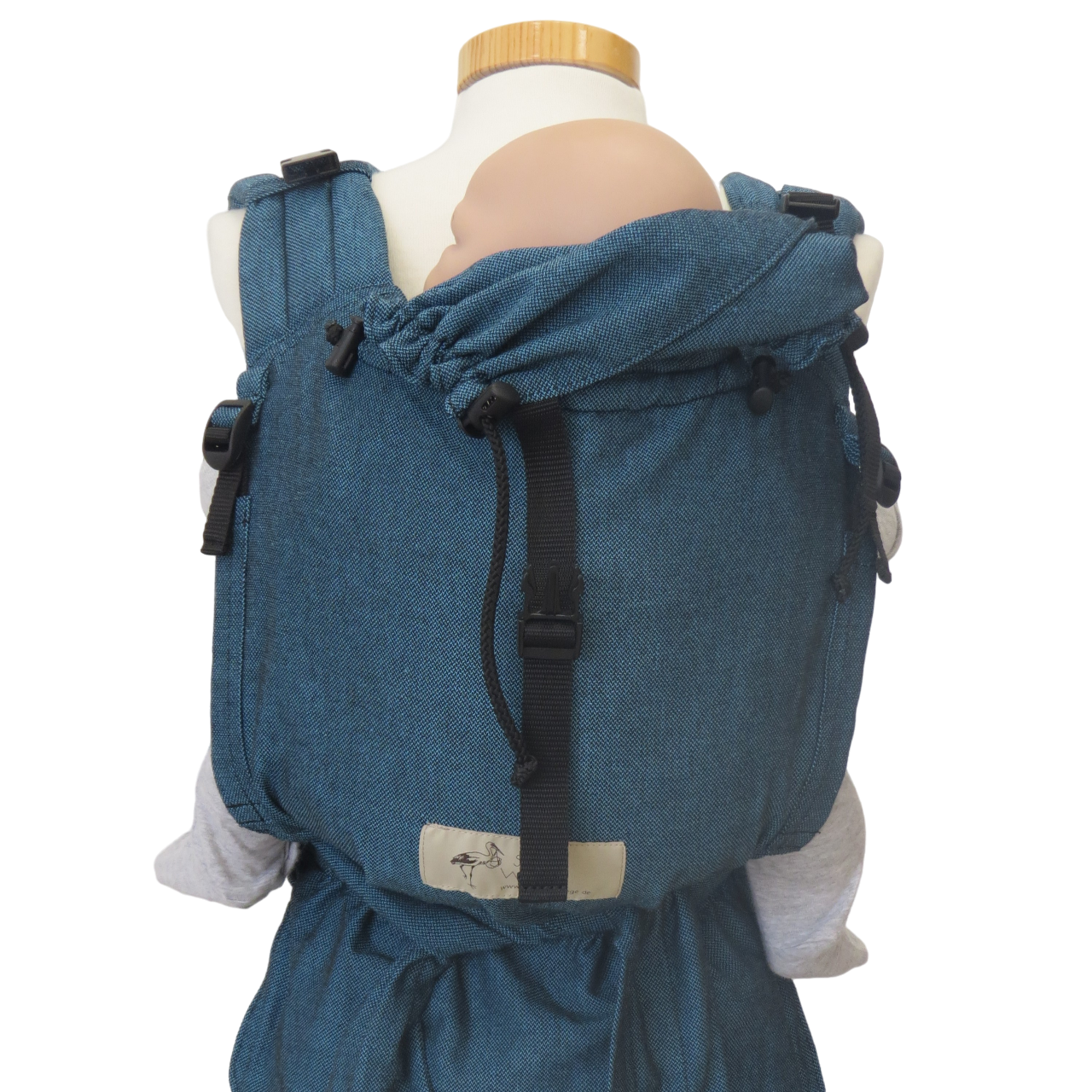 Babycarrier Türkis with adjustable straps and padded waist for front or back carrying.