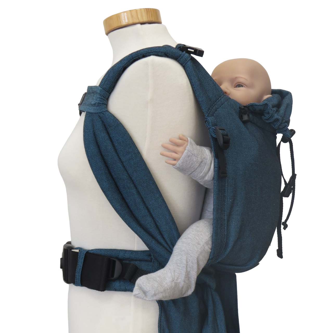 Babycarrier Türkis with adjustable straps and safe buckles for newborn to toddler.