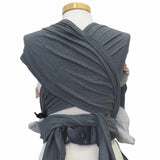 Wrapbabycarrier Graphit with adjustable shoulder straps and hip belt, 100% cotton.