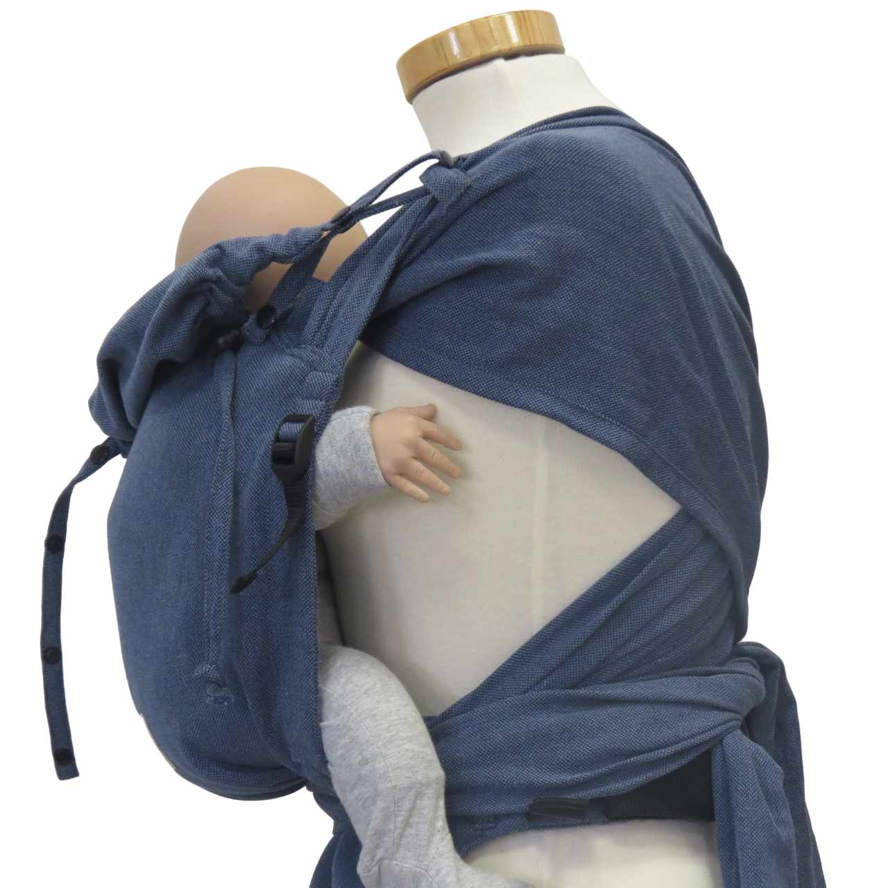Optimal adjustable baby wrap carrier with broad shoulder straps and jeans look.