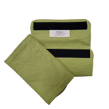 Babycarrier Gurtschoner in green cotton with Velcro fasteners.