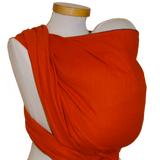 Tragetuch Leo Orange with web pattern, 100% cotton, OEKO-TEX certified, ideal for newborns to toddlers, versatile and easy to bind.