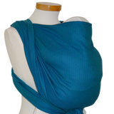 Tragetuch Leo Türkis with delicate weave pattern, 100% cotton, OEKO-TEX certified, suitable from birth.