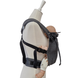 Valeno Graphit baby carrier with padded straps and adjustable safety buckles, suitable from birth, front and back carrying options.