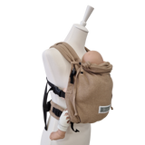 Valeno Sand baby carrier in sand color with full buckles and padded straps on mannequin