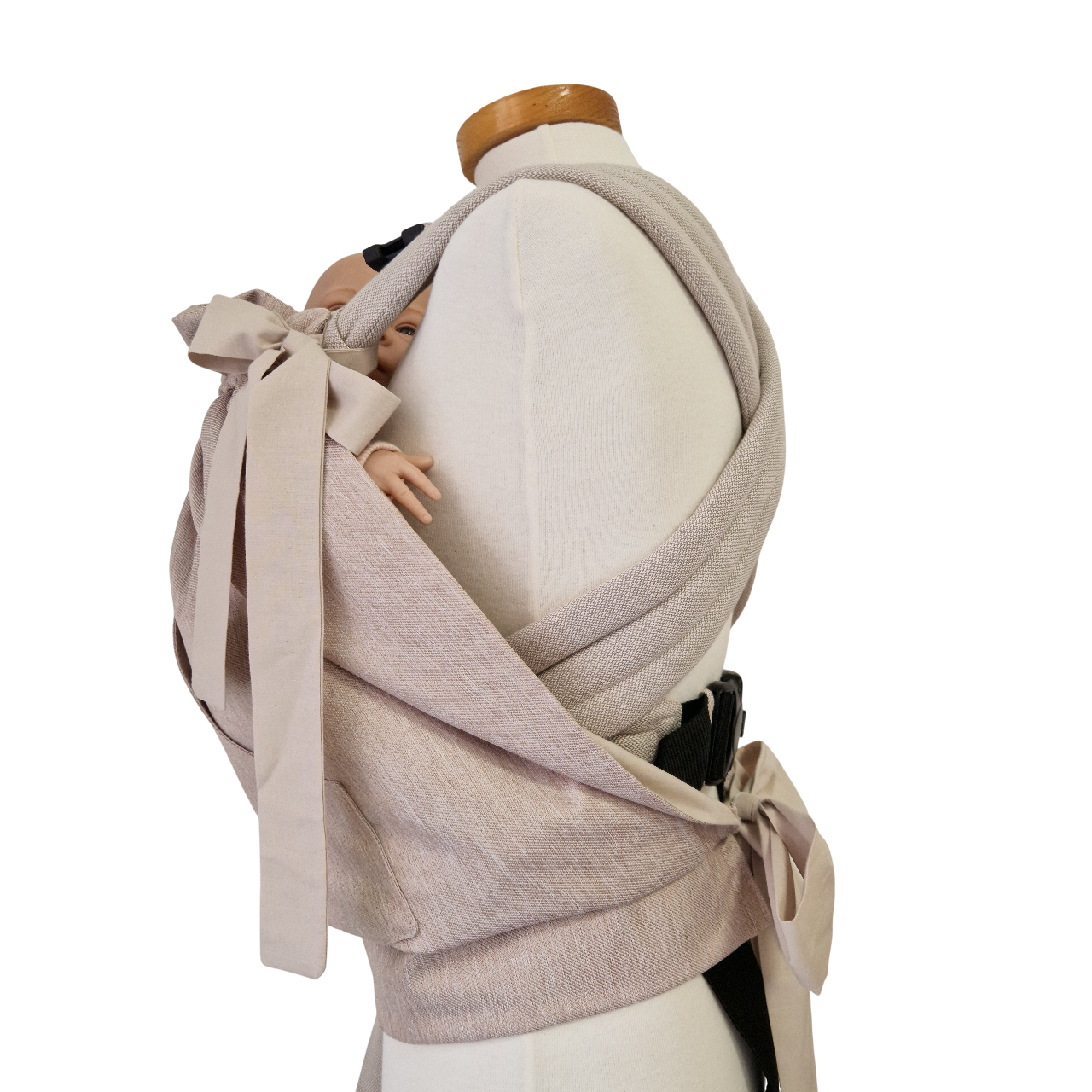 Storchenwiege Tragecover Natur protecting baby in carrier, offering warmth and weather protection with adjustable fit.