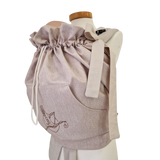 Storchenwiege Tragecover Natur for babywearing protection.