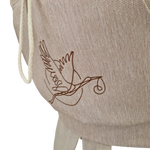 Storchenwiege Tragecover Natur with adjustable drawstrings and stork design.