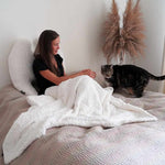 Ergonomic MeroWings Flügelkissen in Naboa faux fur, perfect for lounging and reading.