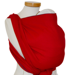 Red baby wrap with subtle woven pattern, made from 100% OEKO-TEX certified cotton, suitable from birth to toddler, easy binding with color-coded edges.