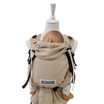 Beige Babycarrier Natur aus Baumwolle mit gepolsterten Trägern und Brustgurt für Neugeborene und Kleinkinder.
