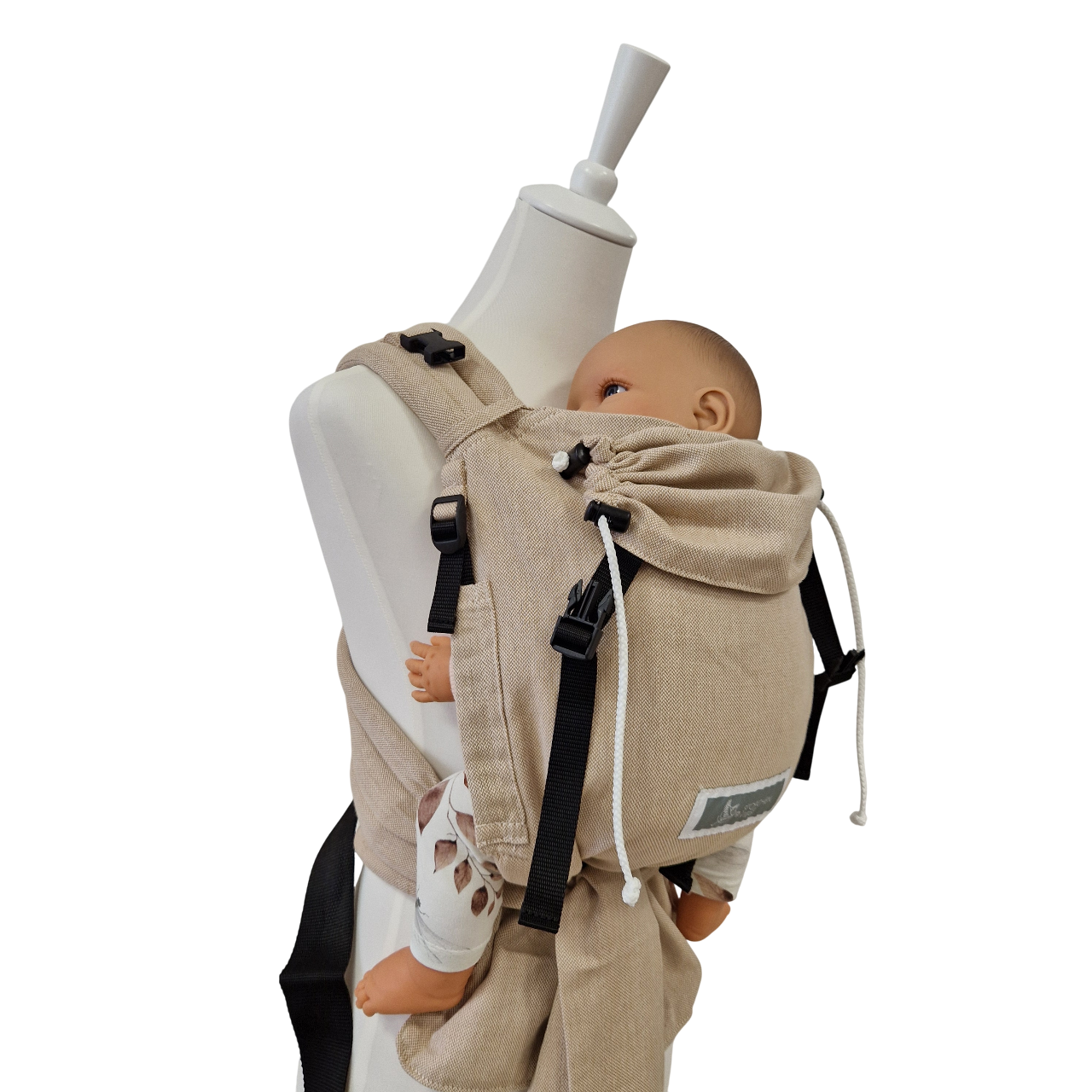 Babycarrier Natur aus 100% Baumwolle in Beige mit gepolsterten Trägern und sicherem Bauchgurt, verstellbar für Babys ab Geburt.