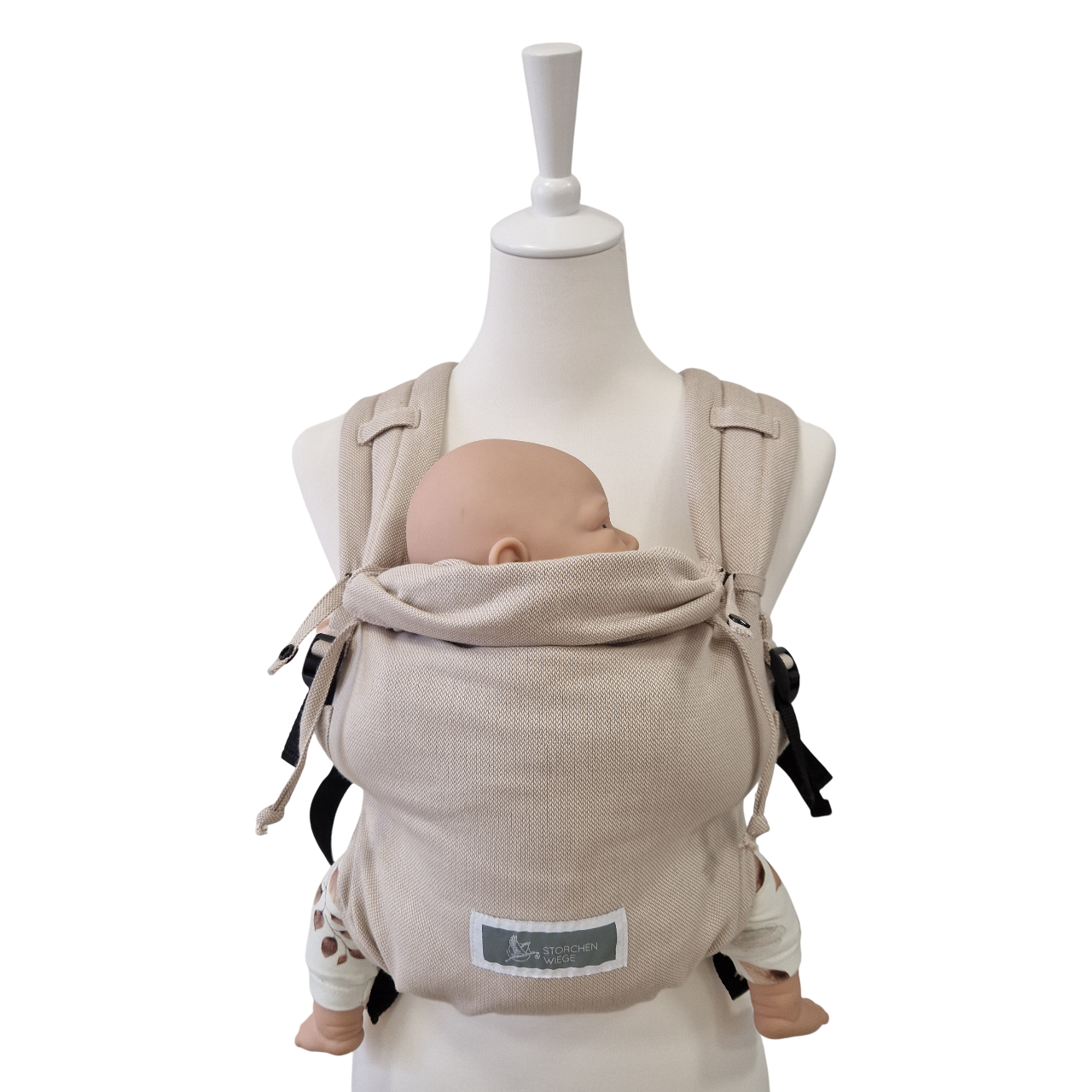 Valeno Mondstein baby carrier with full buckle, padded straps, chest strap, adjustable seat, and integrated head support in beige cotton