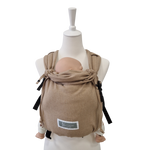 Valeno Sand baby carrier in sand color with full buckle, padded straps, adjustable seat, integrated head support, and front and back carrying options