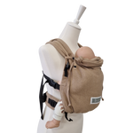 Valeno Sand baby carrier in sand color with full buckles and padded straps on mannequin